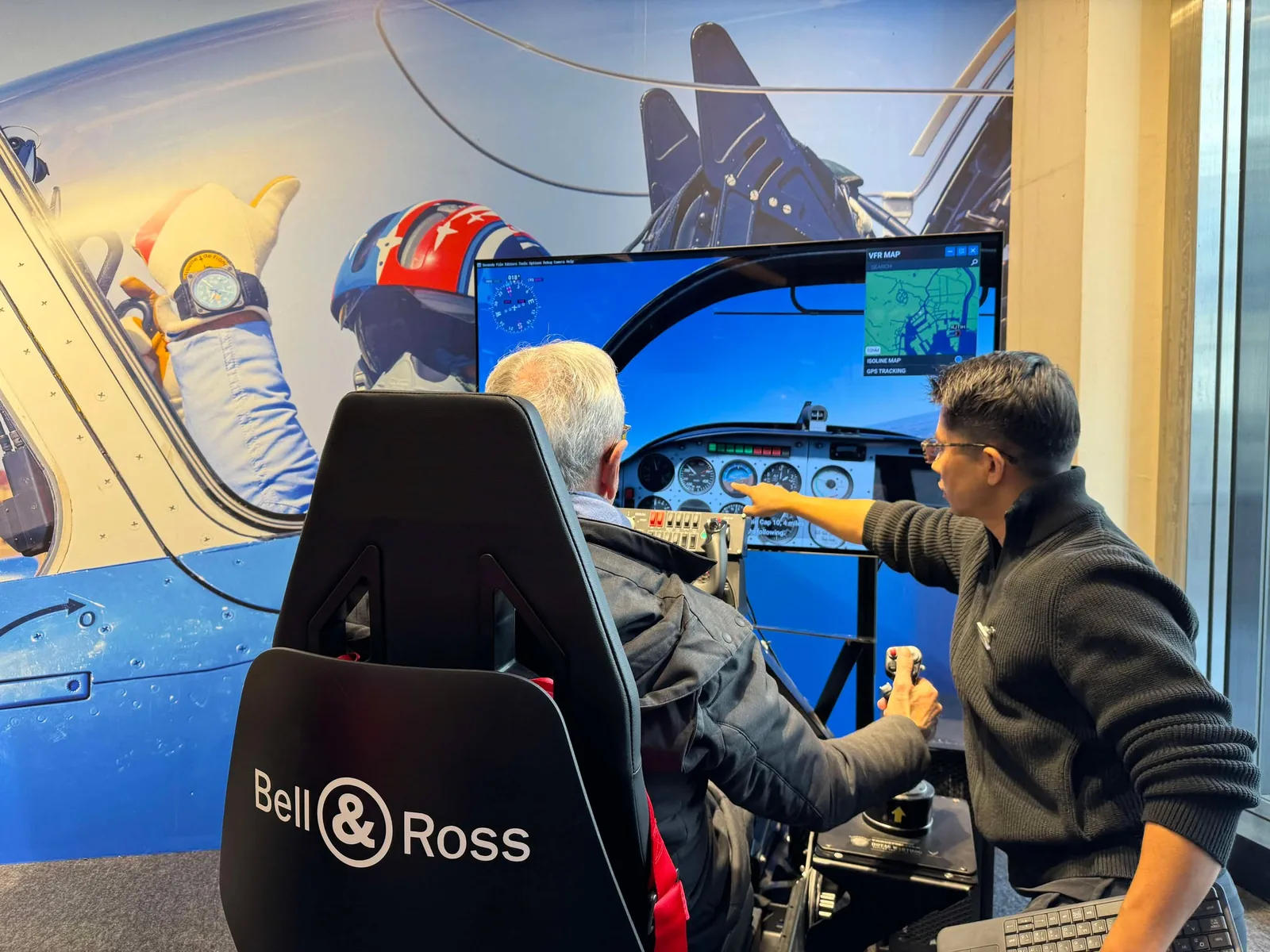 A guest flies the Bell & Ross flight simulator with an Excape coach at a brand activation