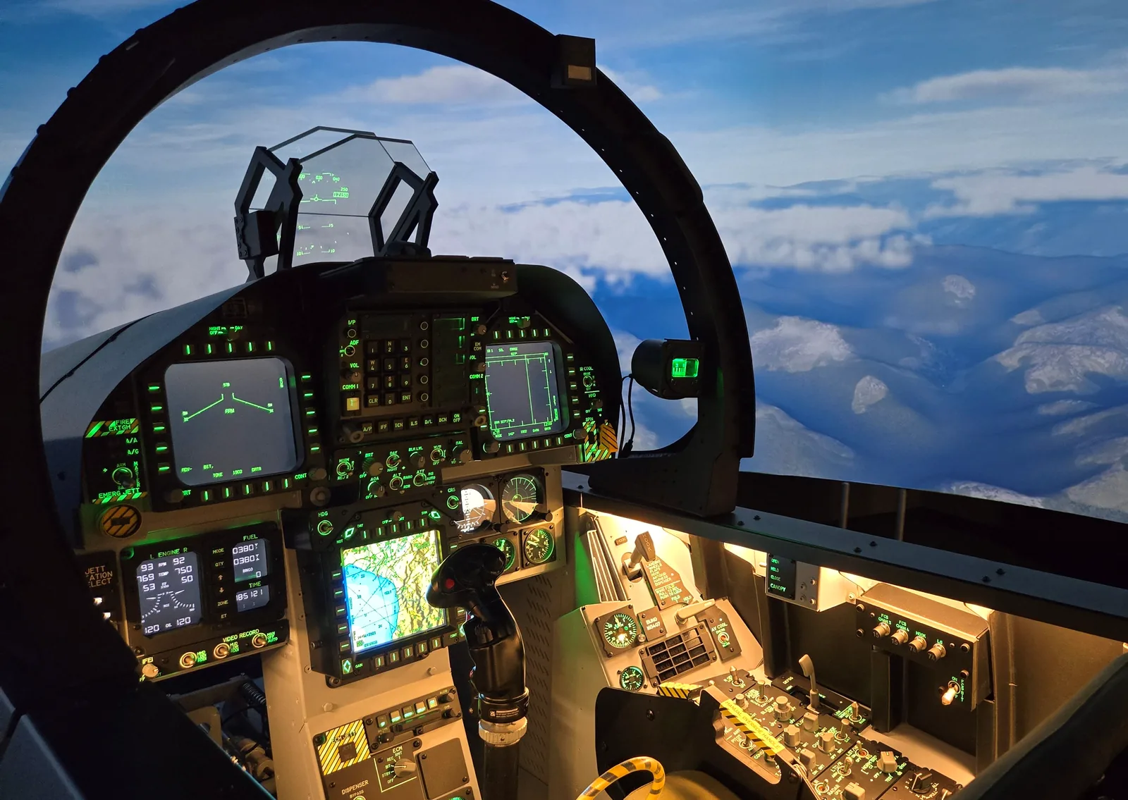 Excape-built fighter-jet simulator cockpit with full instrumentation and wraparound visuals