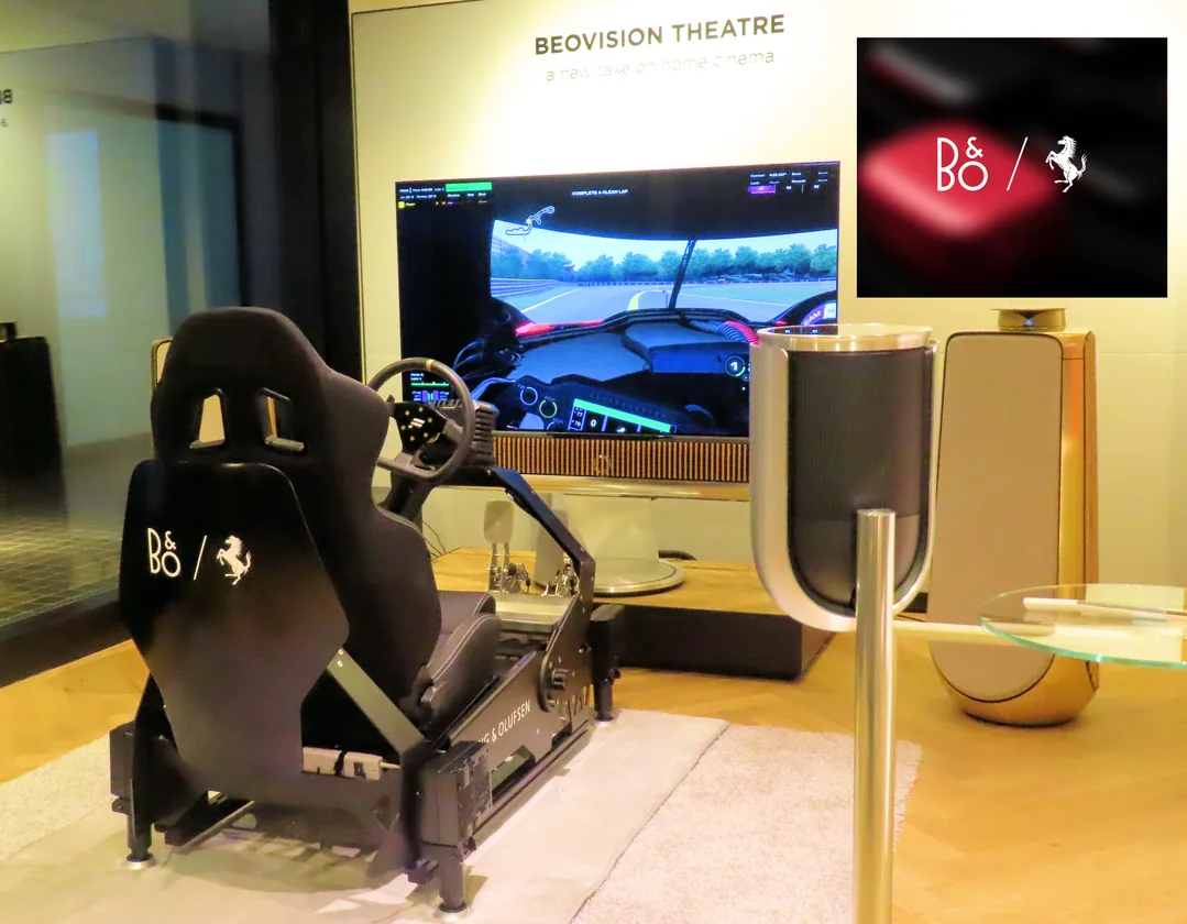 A Ferrari simulator paired with a Bang & Olufsen Beovision Theatre in a showroom