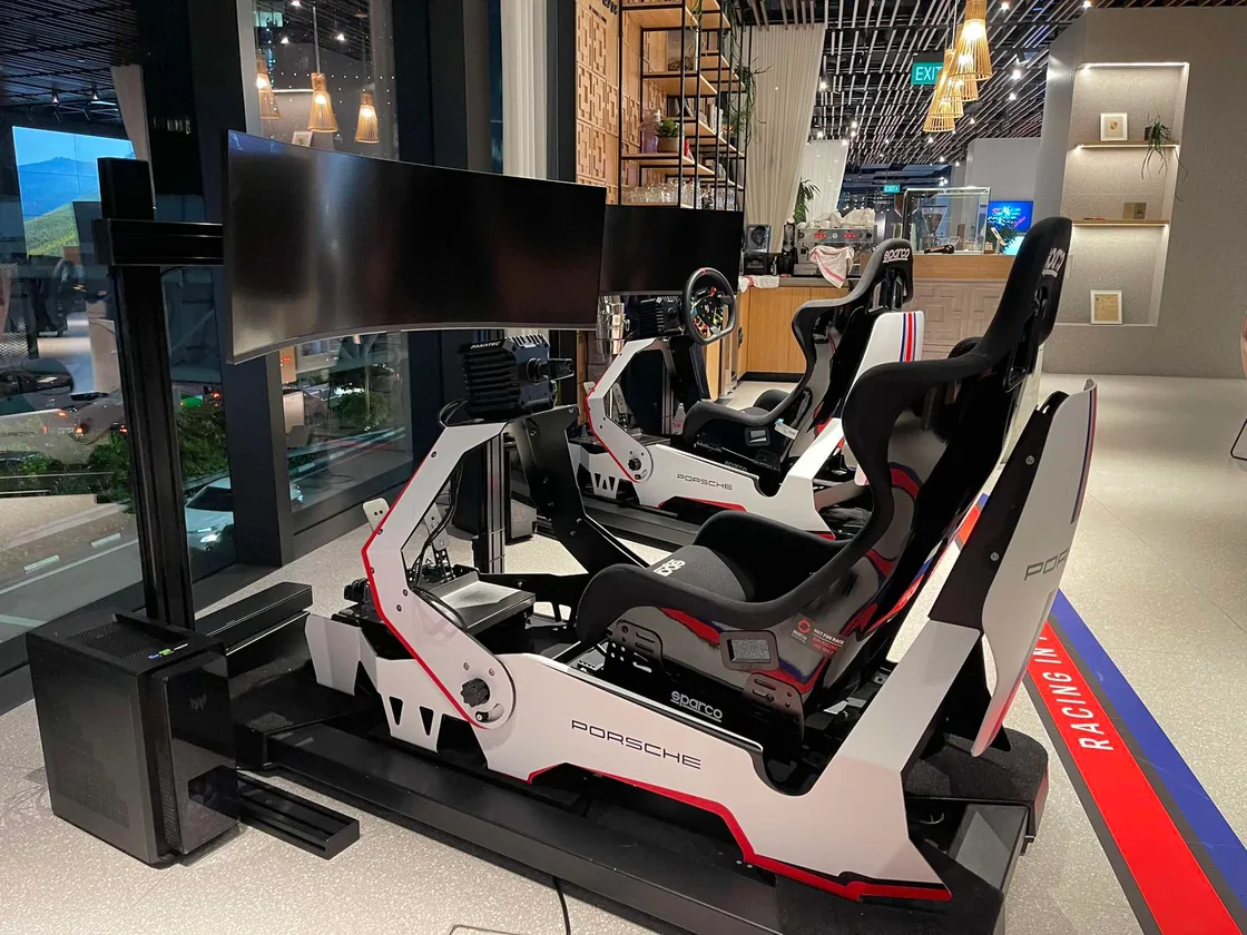 A Porsche Racing simulator installed in a café lobby